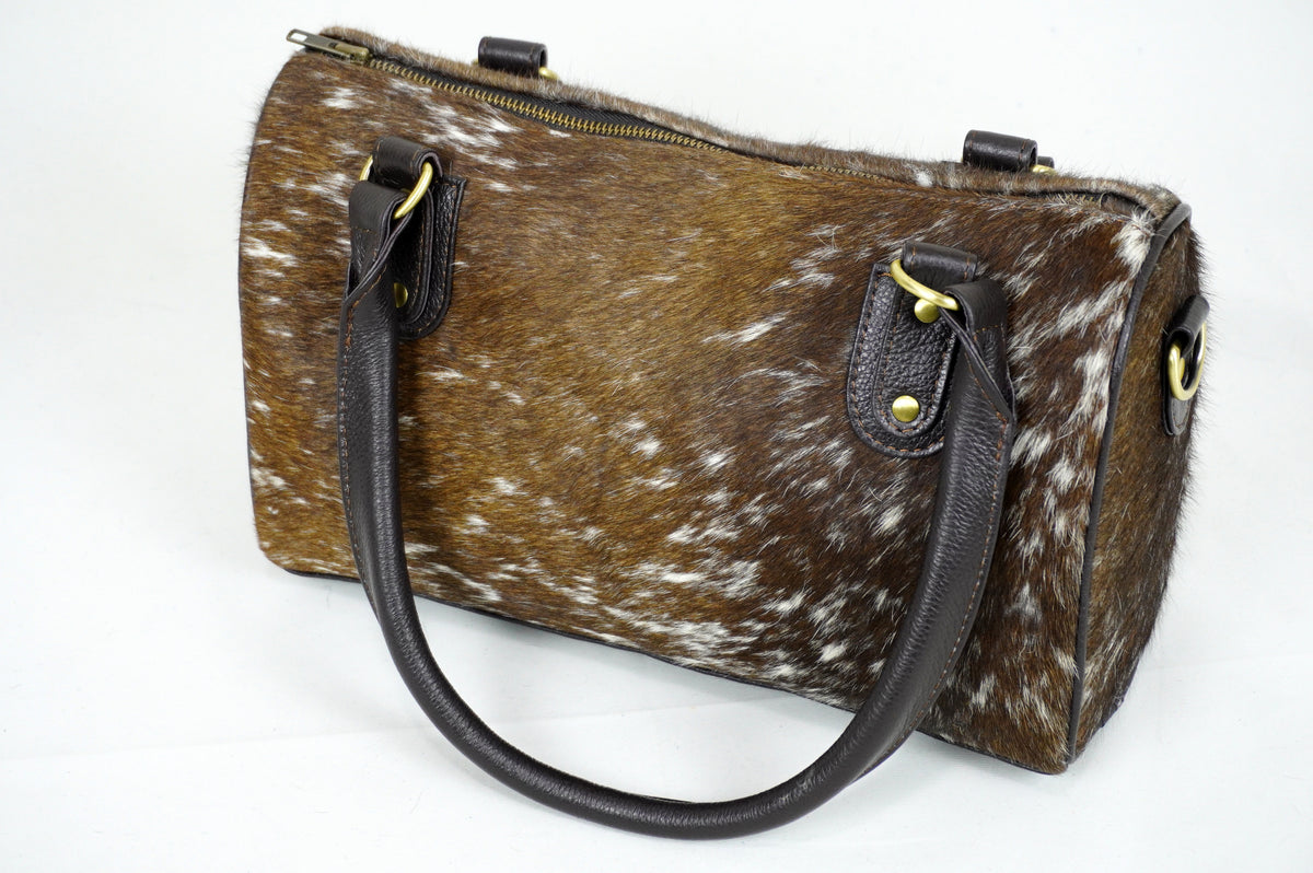 Cow skin outlet bag