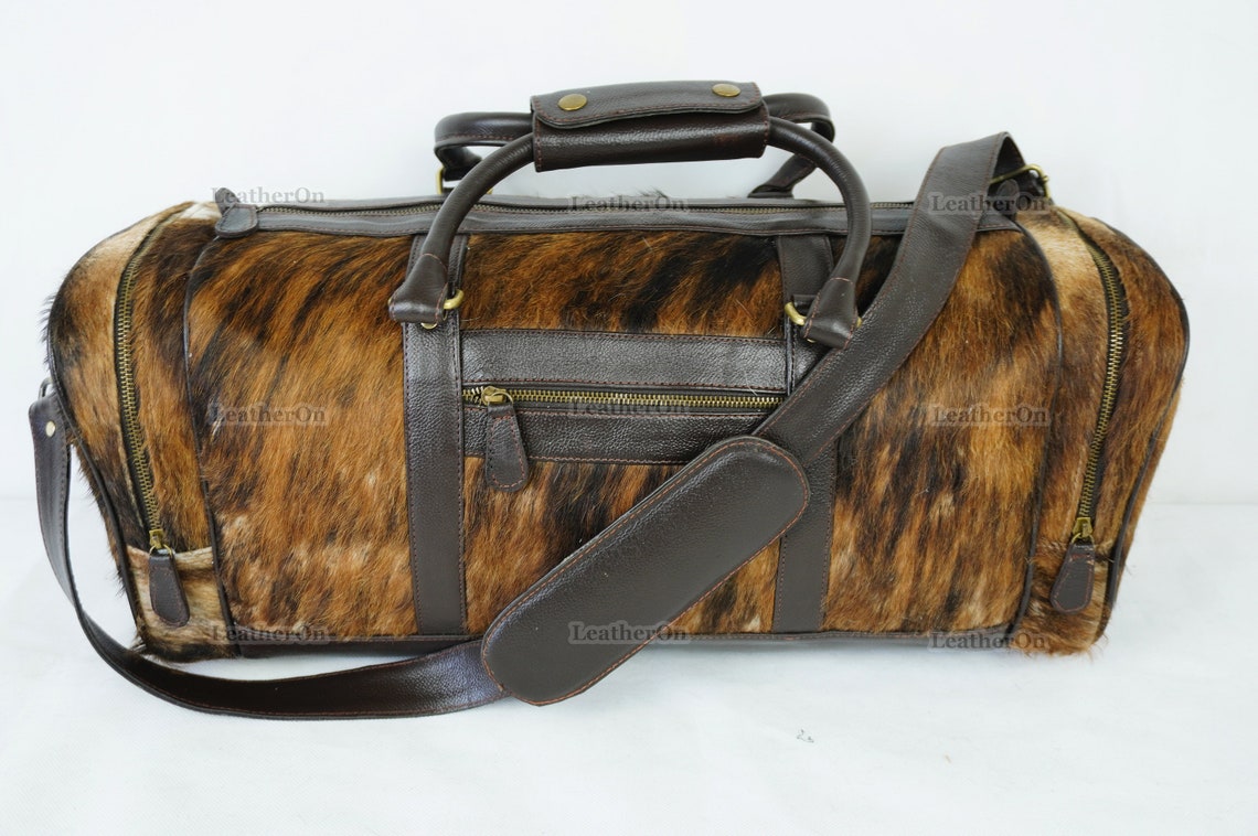 Cowhide shop luggage bags