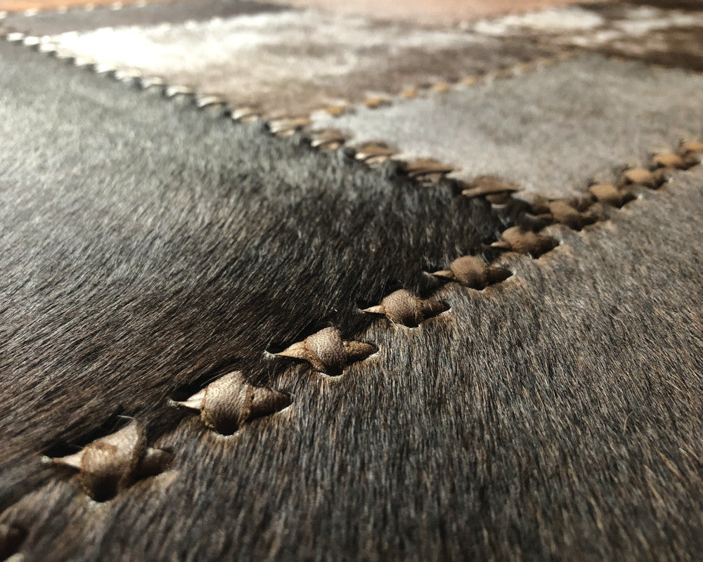 Heritage Brown Cowhide Rug – Hand-Laced Geometric Leather Patchwork Area Rug