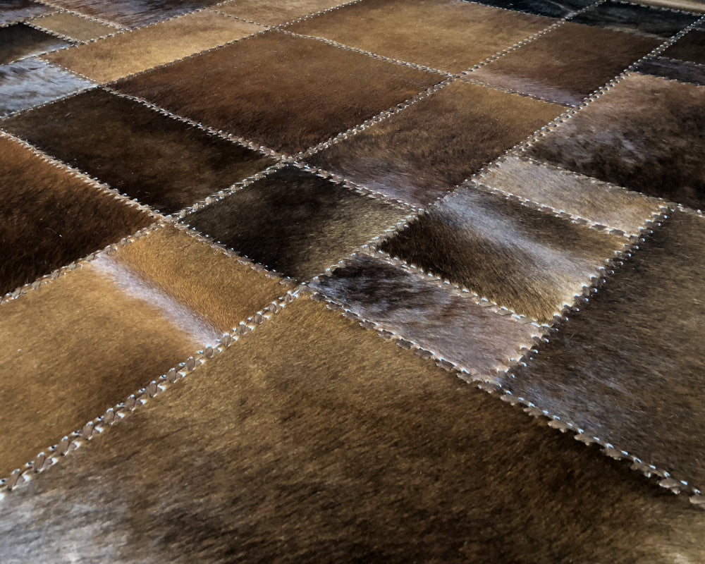 Heritage Brown Cowhide Rug – Hand-Laced Geometric Leather Patchwork Area Rug