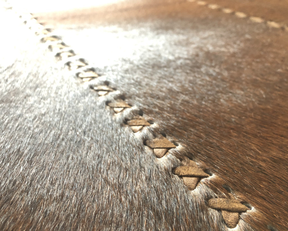 Heritage Brown Cowhide Rug – Hand-Laced Geometric Leather Patchwork Area Rug