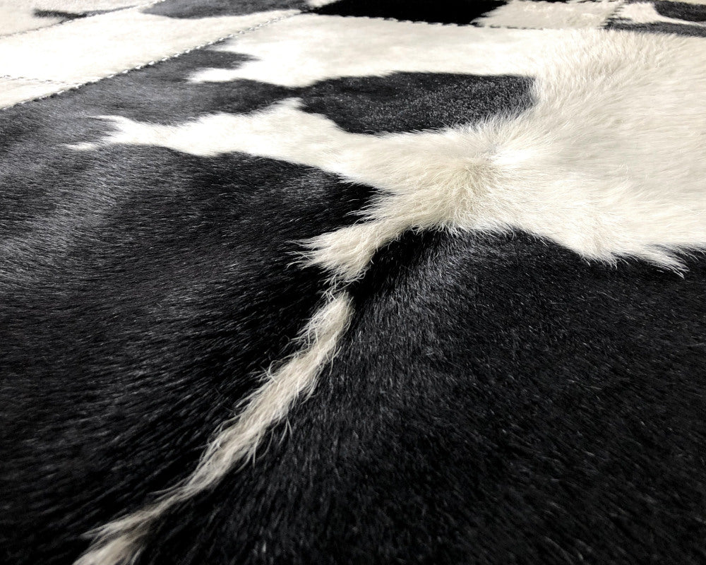 High-Contrast Black White Cowhide Rug – Hand-Laced Patchwork Area Rug