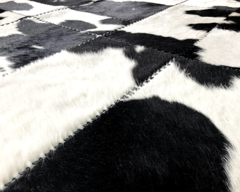 High-Contrast Black White Cowhide Rug – Hand-Laced Patchwork Area Rug
