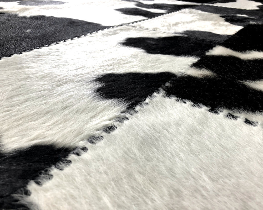 High-Contrast Black White Cowhide Rug – Hand-Laced Patchwork Area Rug