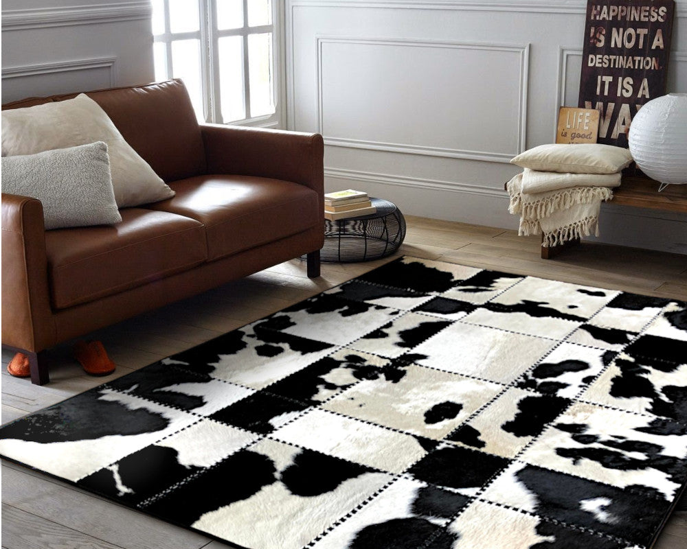 Black & White Spotted Cowhide Rug – Hand-Laced Patchwork Area Rug
