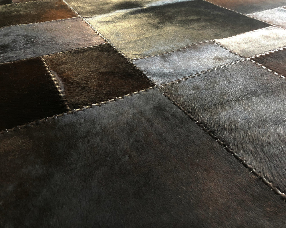 Obsidian Black Cowhide Rug – Hand-Laced Modern Geometric Patchwork Area Rug