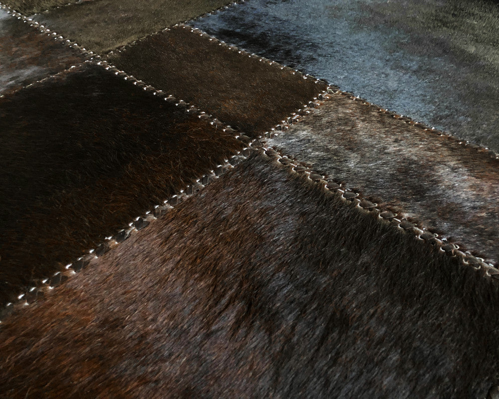 Obsidian Black Cowhide Rug – Hand-Laced Modern Geometric Patchwork Area Rug