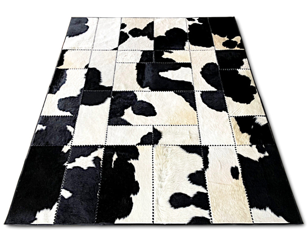 Holstein Black & White Cowhide Rug – Hand-Laced Patchwork Area Rug