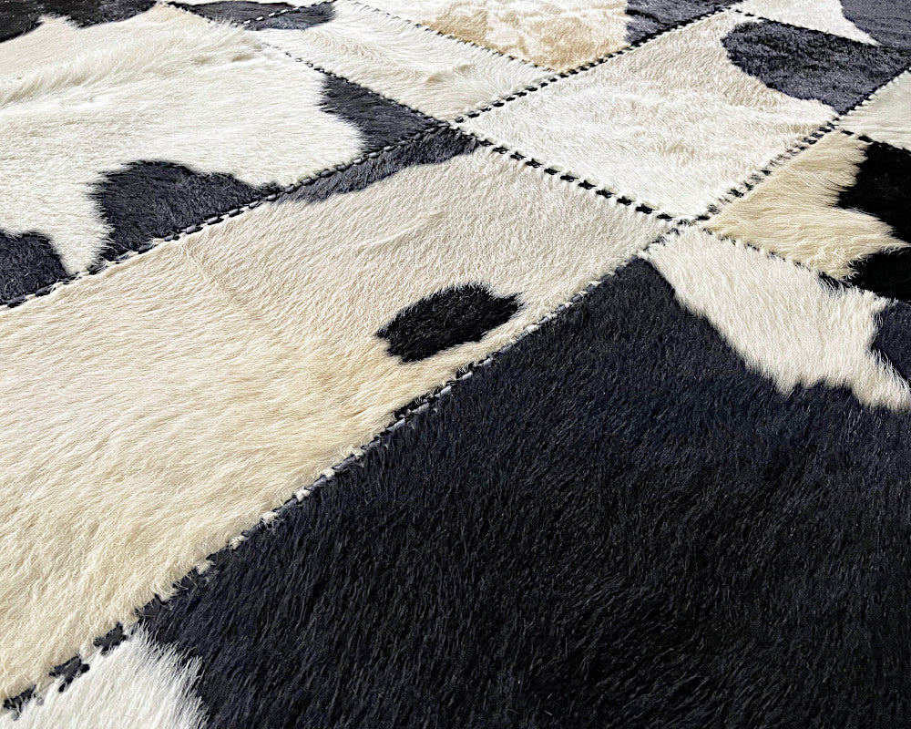 Holstein Black & White Cowhide Rug – Hand-Laced Patchwork Area Rug