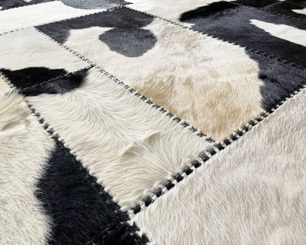 Holstein Black & White Cowhide Rug – Hand-Laced Patchwork Area Rug
