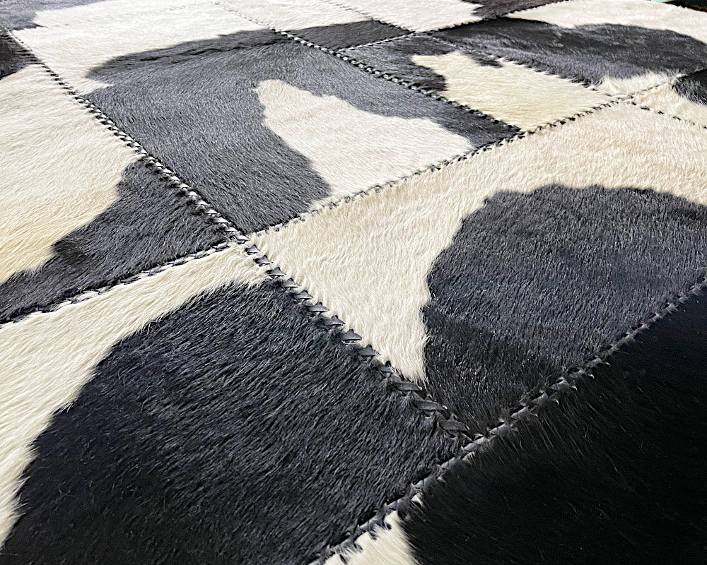 Holstein Black & White Cowhide Rug – Hand-Laced Patchwork Area Rug