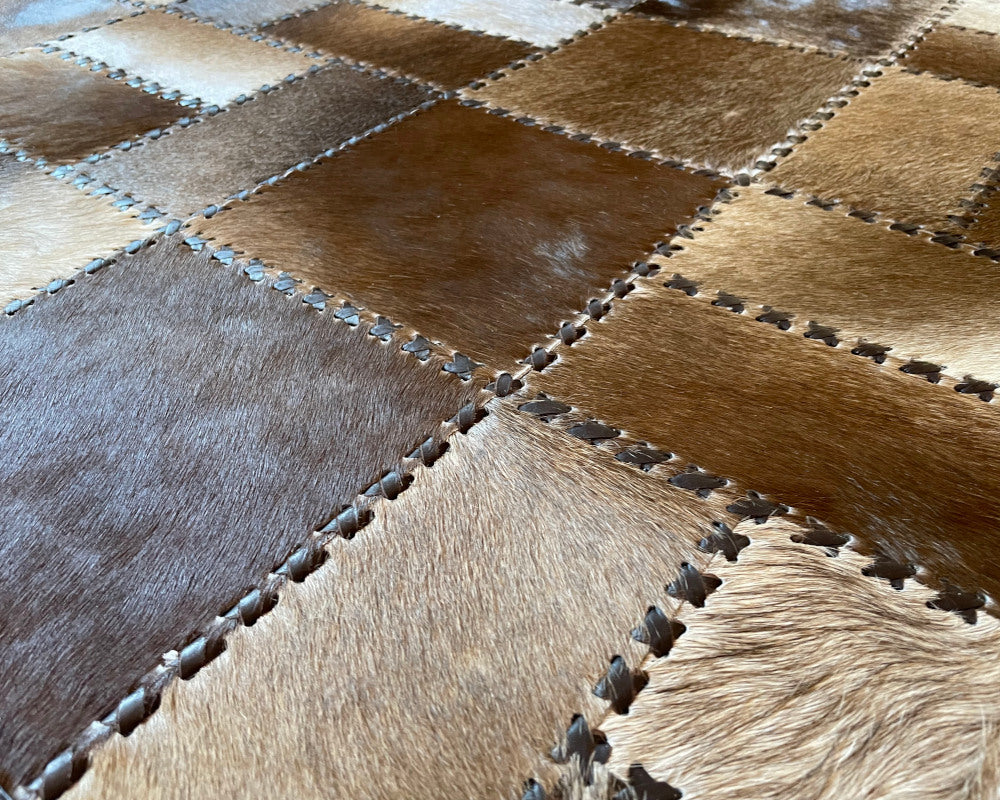 Woven Mosaic Cowhide Rug – Hand-Laced Taupe & Ivory Patchwork Area Rug