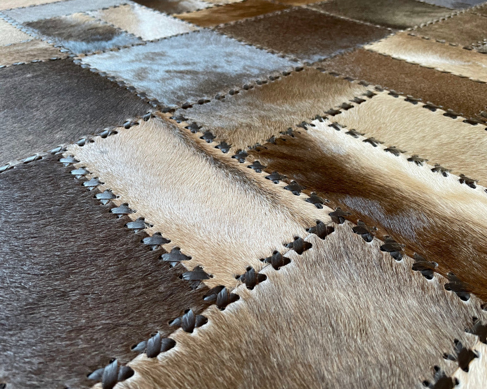Woven Mosaic Cowhide Rug – Hand-Laced Taupe & Ivory Patchwork Area Rug