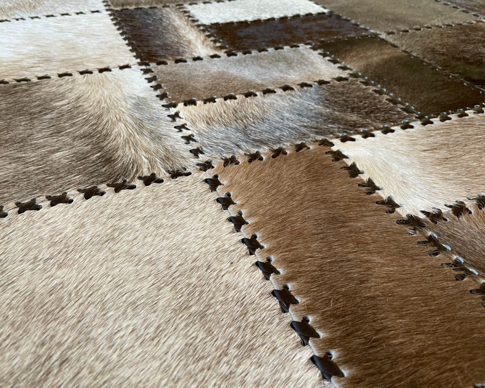 Woven Mosaic Cowhide Rug – Hand-Laced Taupe & Ivory Patchwork Area Rug