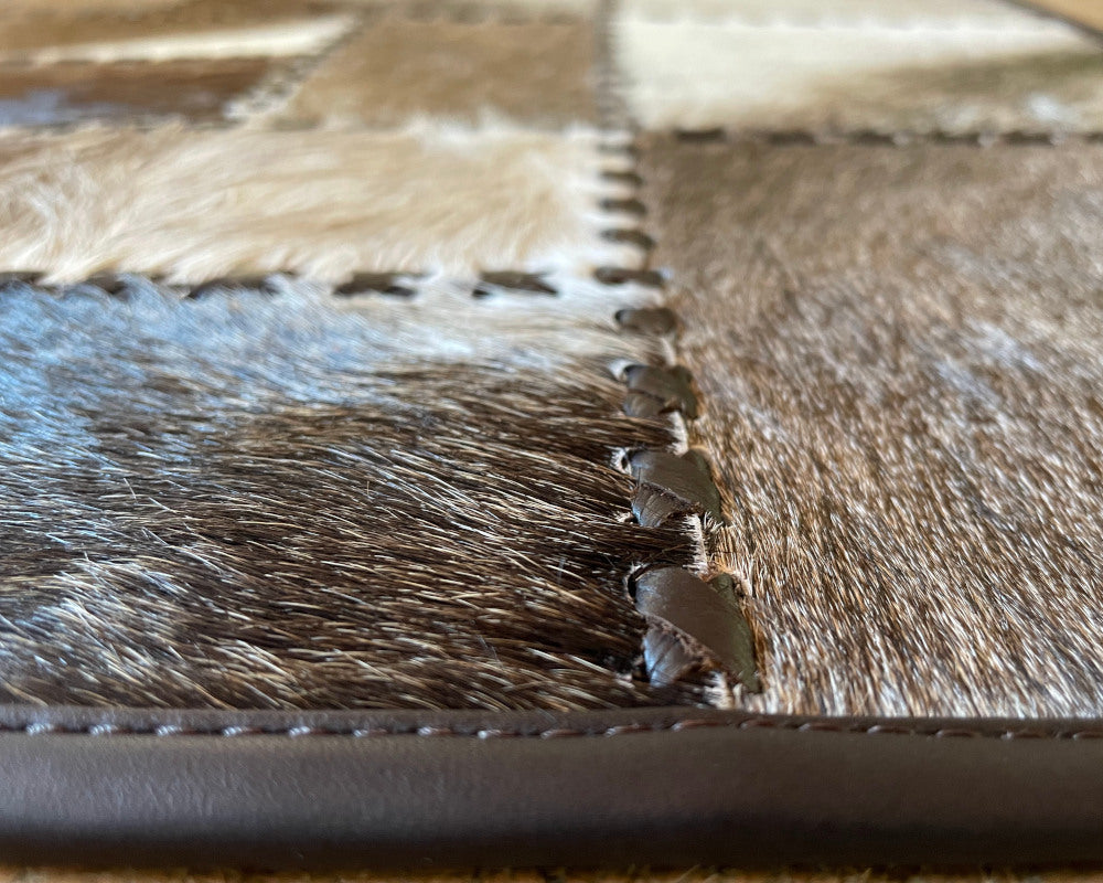 Woven Mosaic Cowhide Rug – Hand-Laced Taupe & Ivory Patchwork Area Rug