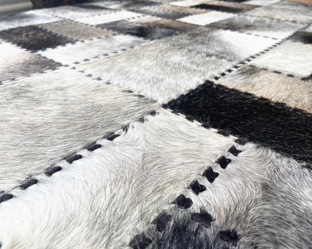 Silverstone Cowhide Rug – Hand-Laced Mosaic Patchwork Area Rug