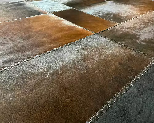 Artisan Cowhide Patchwork Rug – Hand-Laced Hair on Hide Area Rug