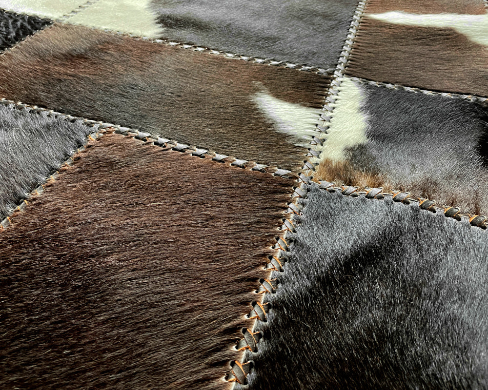 Onyx Black Cowhide Rug – Hand-Laced Spotted Patchwork Area Rug