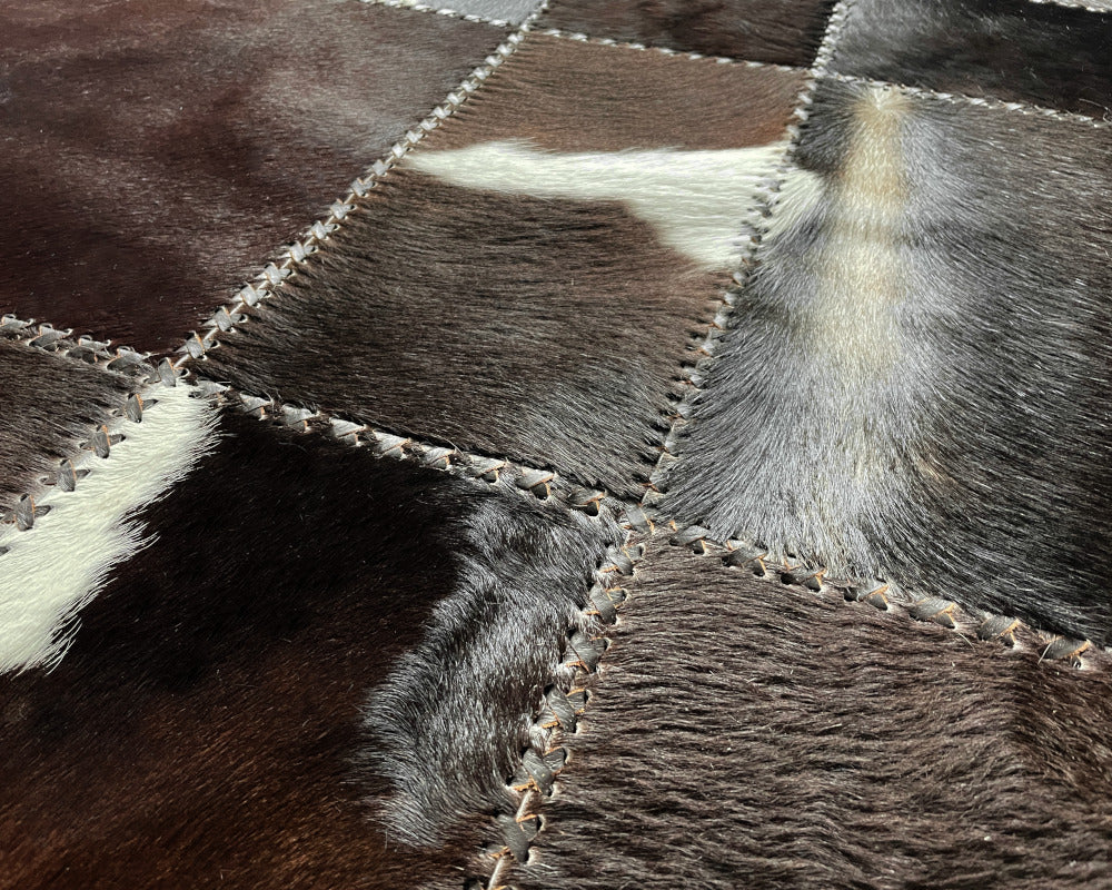 Onyx Black Cowhide Rug – Hand-Laced Spotted Patchwork Area Rug