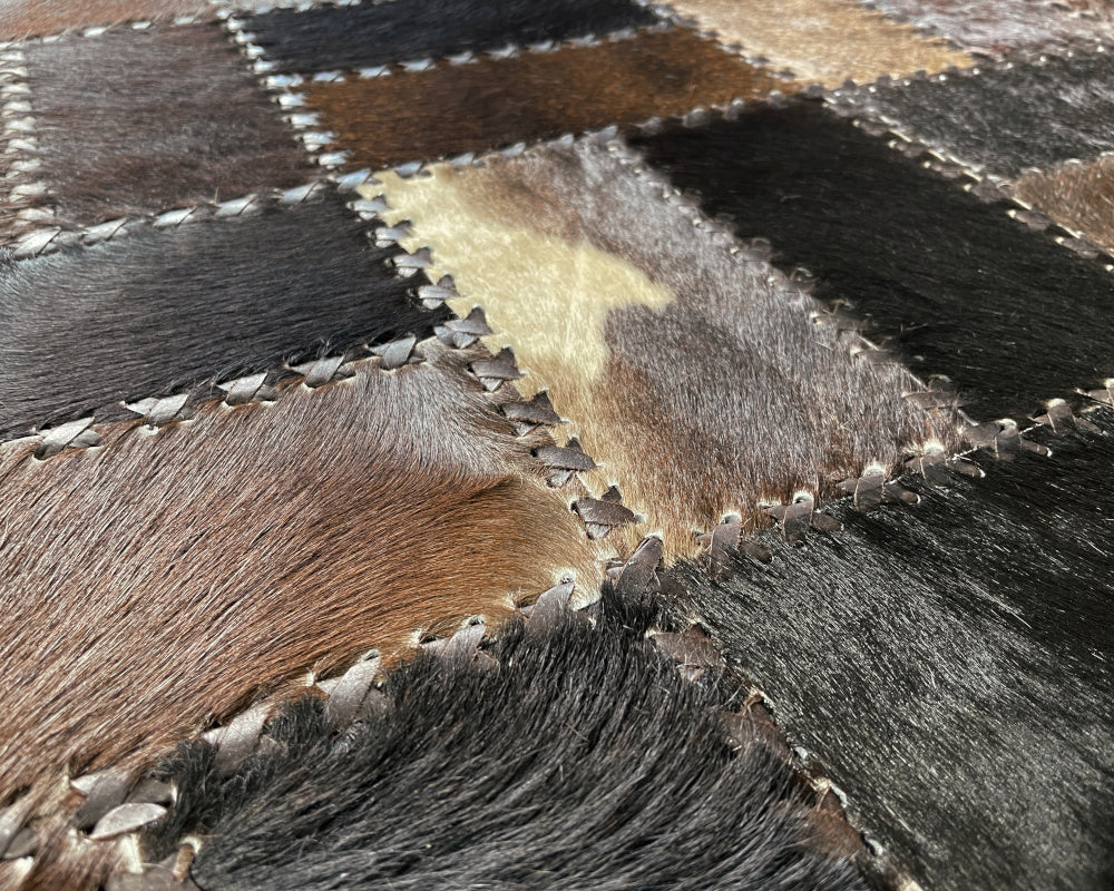 Woven Mosaic Cowhide Rug – Hand-Laced Dark Multicolor Patchwork Area Rug