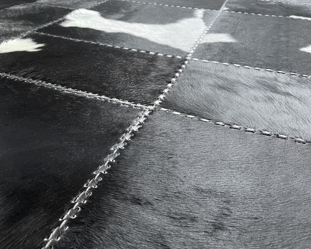 Midnight Black Cowhide Rug – Hand-Laced Charcoal Patchwork Area Rug