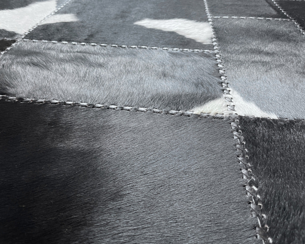 Midnight Black Cowhide Rug – Hand-Laced Charcoal Patchwork Area Rug