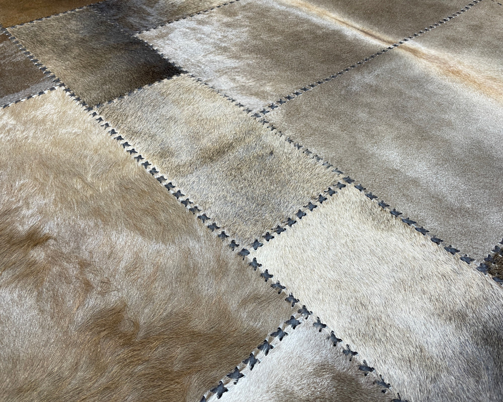 Champagne Beige Cowhide Rug – Hand-Laced Framed Patchwork Area Rug