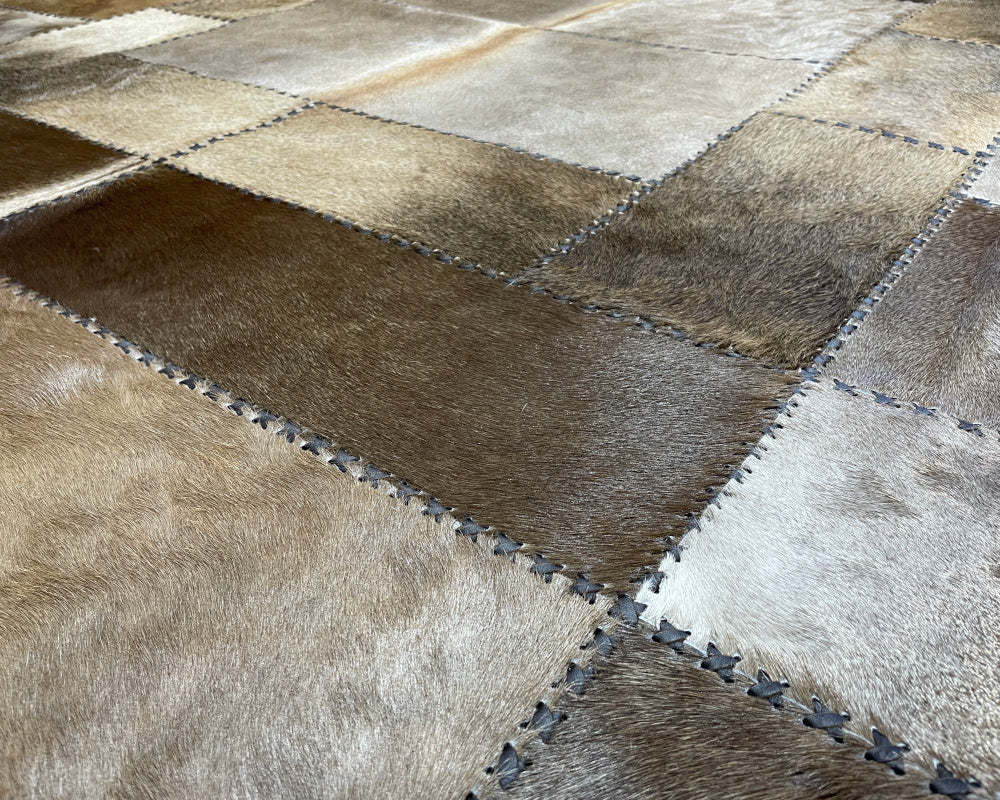 Champagne Beige Cowhide Rug – Hand-Laced Framed Patchwork Area Rug