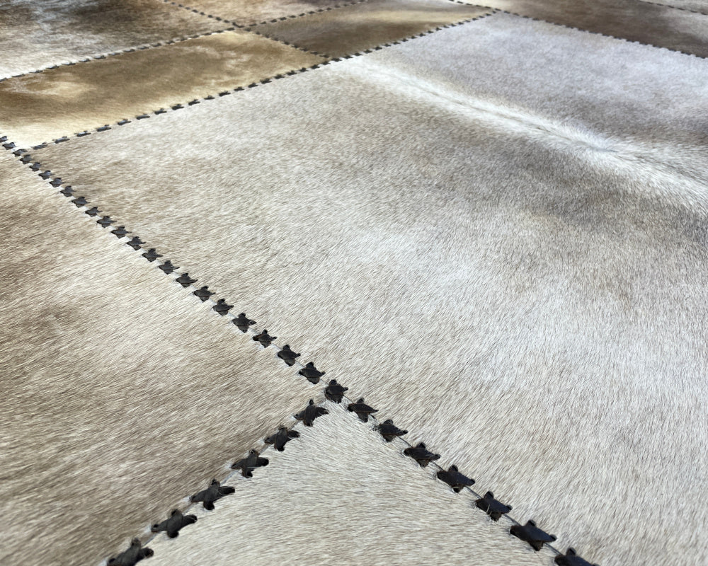 Stone Ivory Cowhide Rug – Hand-Laced Framed Patchwork Area Rug