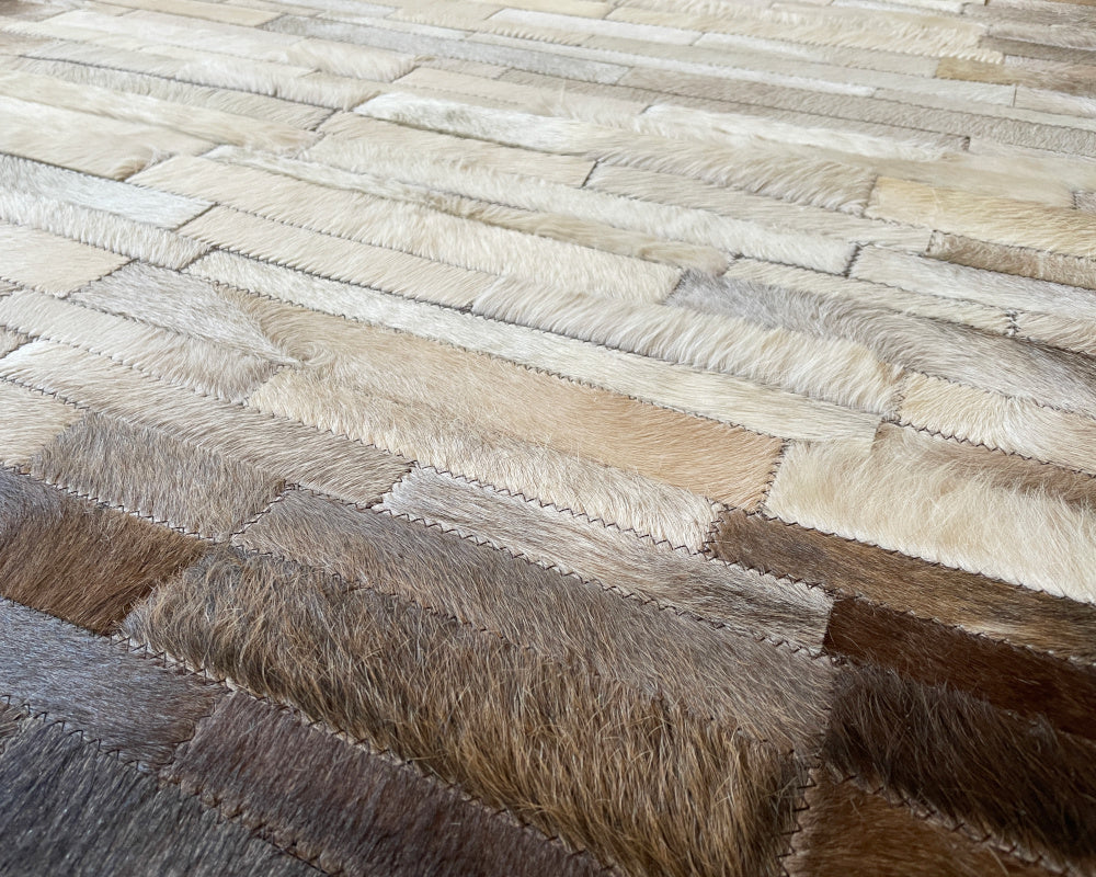 Ivory Halo Cowhide Patchwork Rug – Cream Center & Brown Gradient Vertical Strip Area Rug