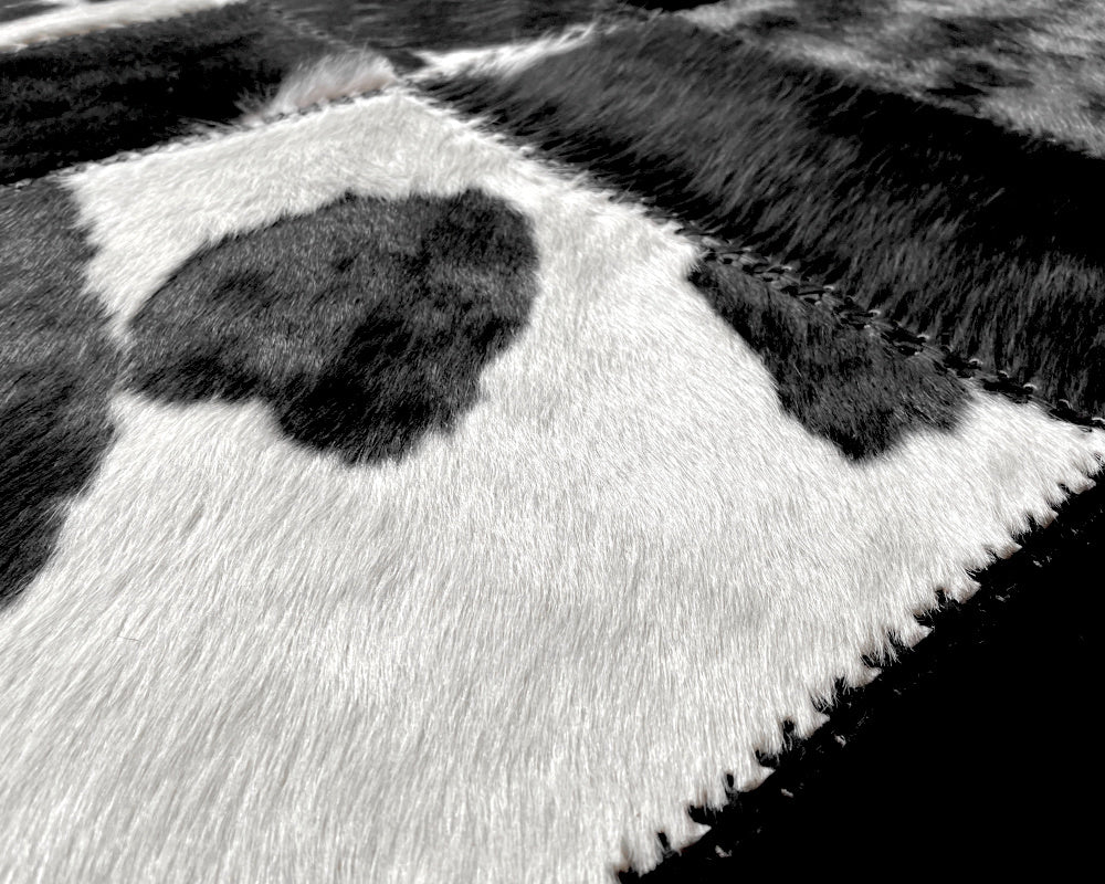 Tuxedo Black & White Cowhide Rug – Hand-Laced Geometric Patchwork Area Rug