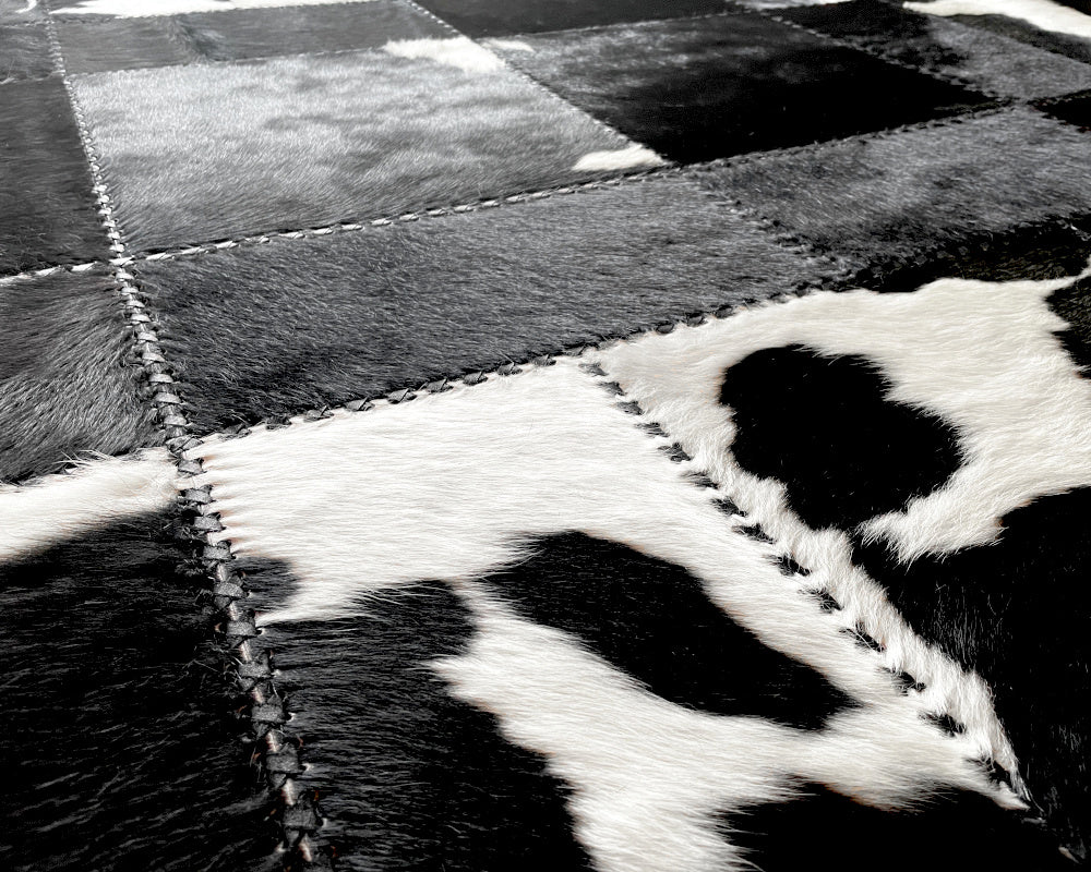 Tuxedo Black & White Cowhide Rug – Hand-Laced Geometric Patchwork Area Rug