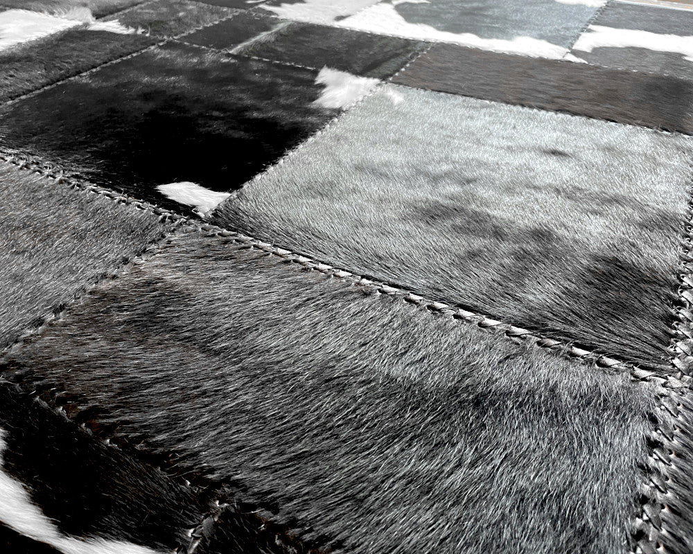 Tuxedo Black & White Cowhide Rug – Hand-Laced Geometric Patchwork Area Rug