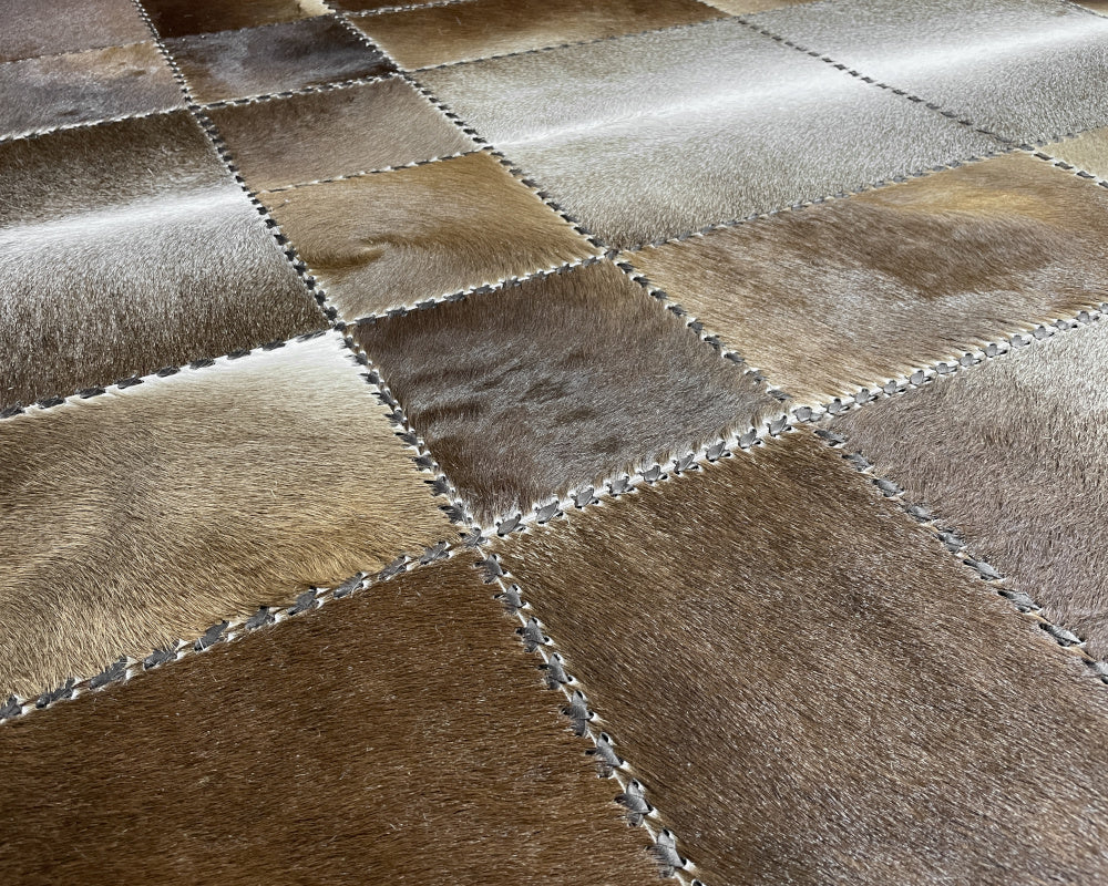 Mocha & Silver Cowhide Rug – Hand-Laced Framed Patchwork Area Rug
