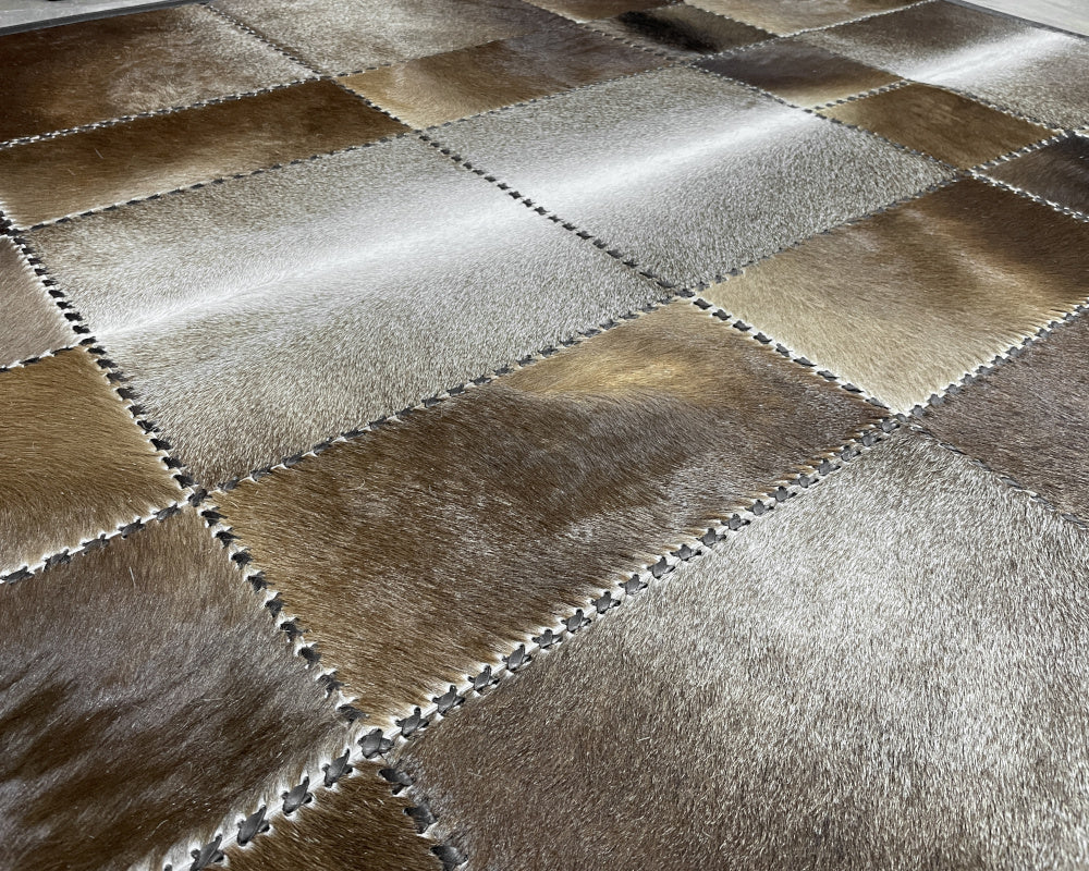 Mocha & Silver Cowhide Rug – Hand-Laced Framed Patchwork Area Rug