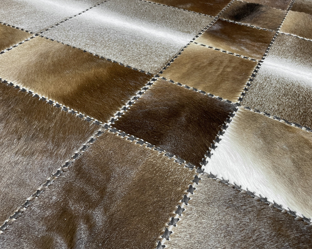 Mocha & Silver Cowhide Rug – Hand-Laced Framed Patchwork Area Rug