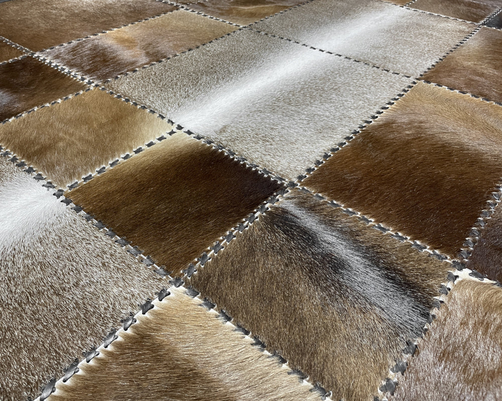 Mocha & Silver Cowhide Rug – Hand-Laced Framed Patchwork Area Rug