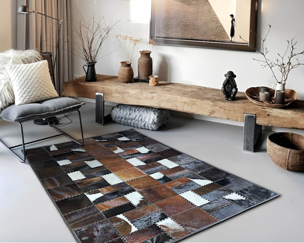 Luxury Cowhide Area Rug – Hand-Laced Leather Patchwork Design