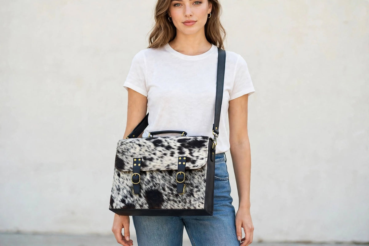 cowhide crossbody bag worn by model size reference