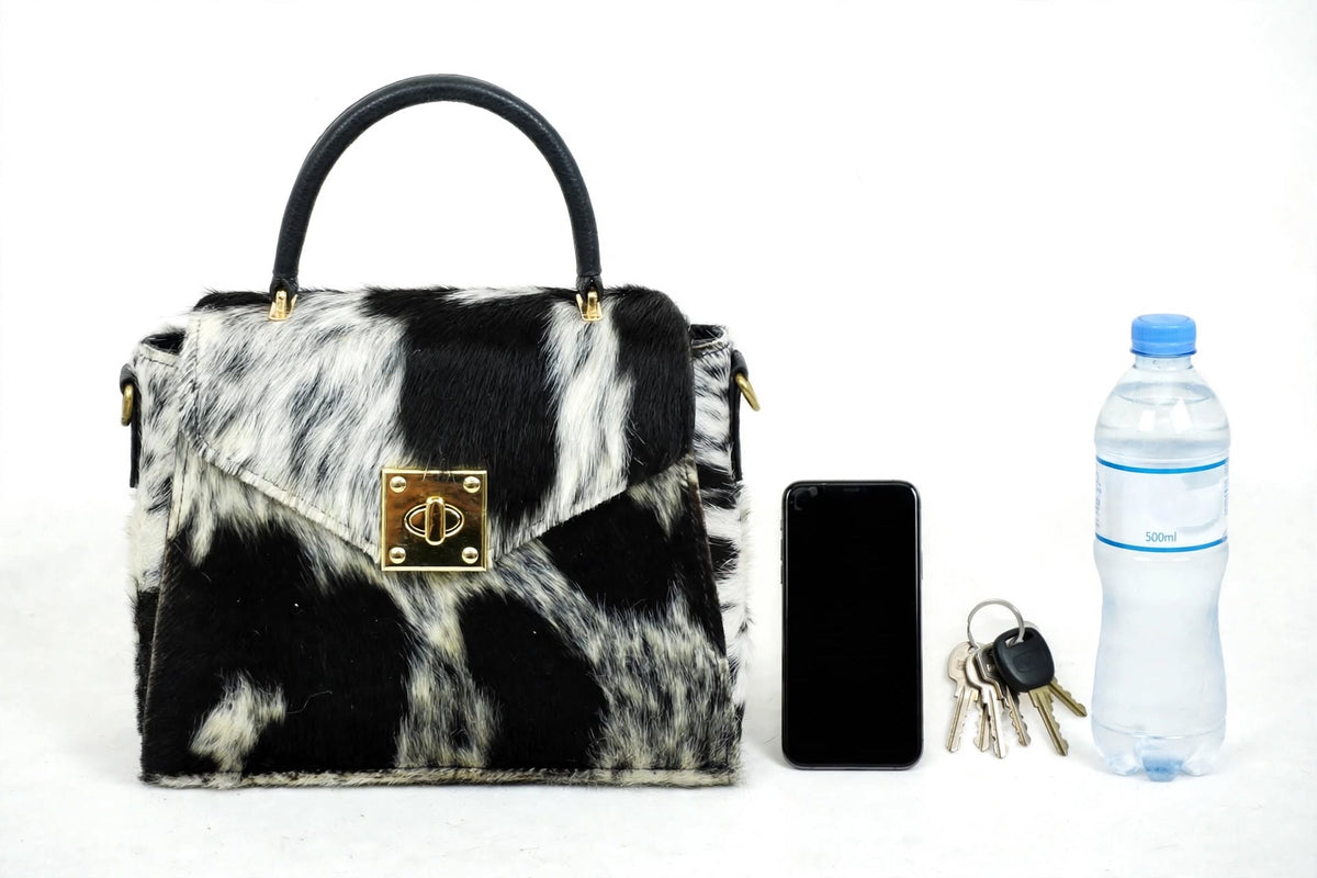 Cowhide leather satchel bag everyday view with exterior zip pocket