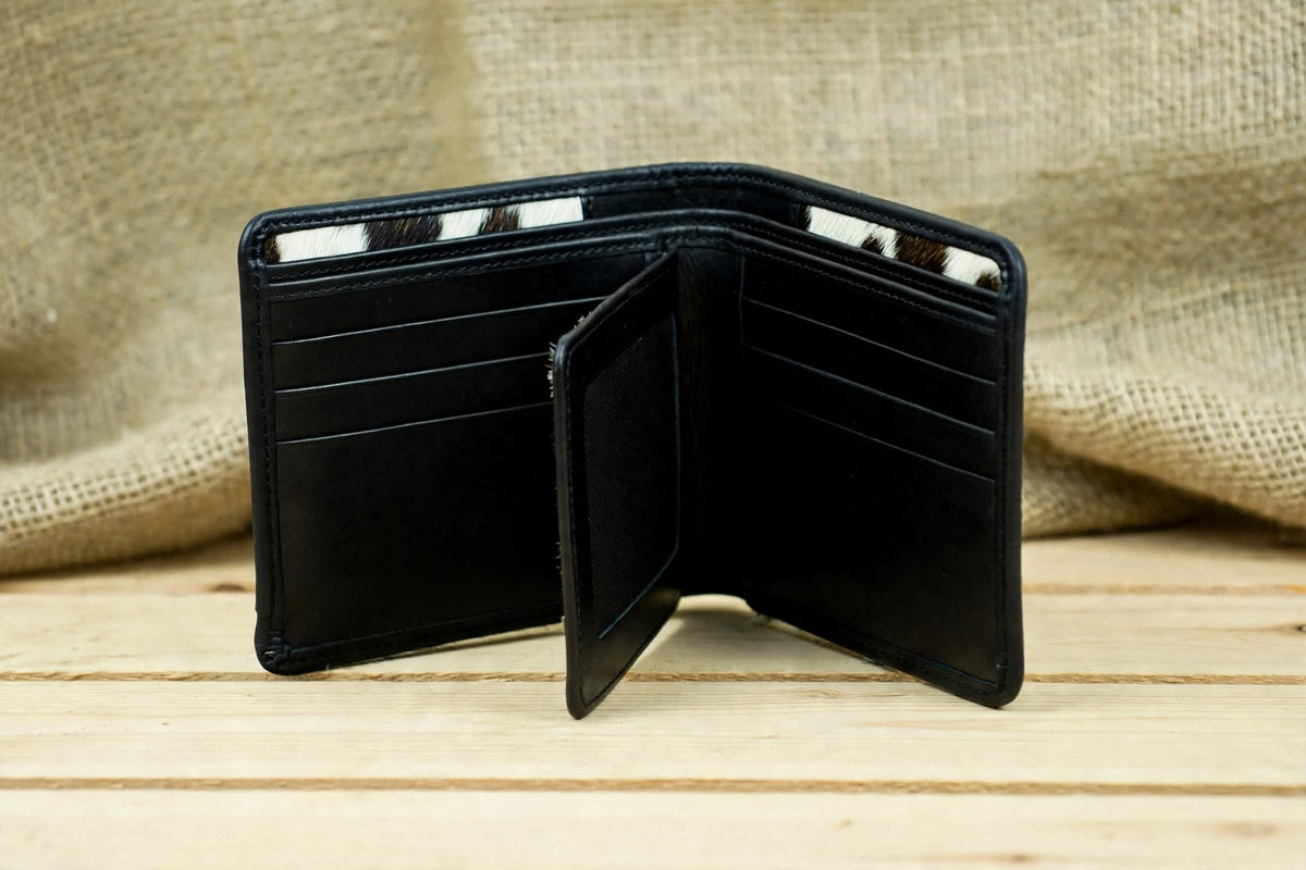 Interior View: Interior of a cowhide bifold wallet showing its compartments and card storage sections.
