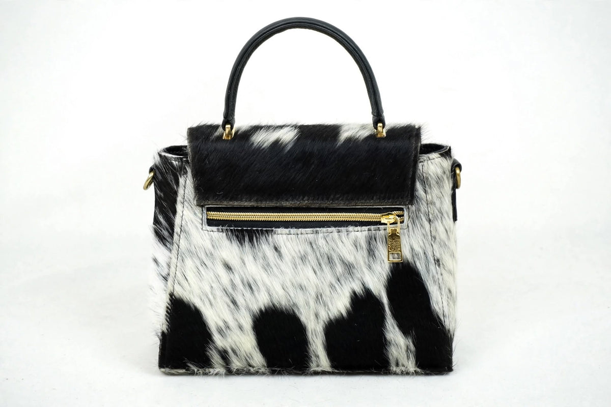 Cowhide leather satchel bag back view with exterior zip pocket