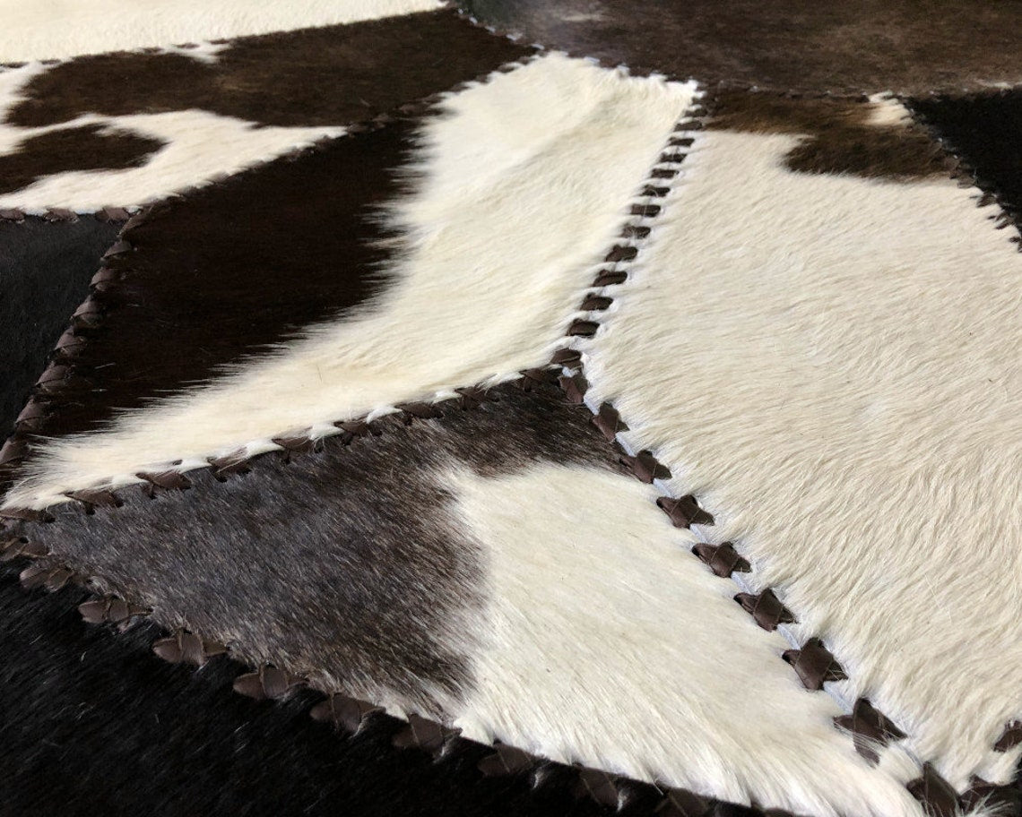 Exquisite Handcrafted Cowhide Masterpiece, 100% Natural Patchwork Area Rug | Hair on Leather Cowhide Carpet with Leather Braided Work | PR107