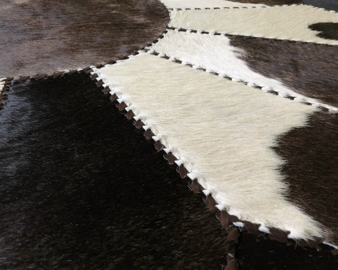 Exquisite Handcrafted Cowhide Masterpiece, 100% Natural Patchwork Area Rug | Hair on Leather Cowhide Carpet with Leather Braided Work | PR107